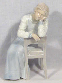 Appraisal: A Danish figure of a seated lady circa cm high