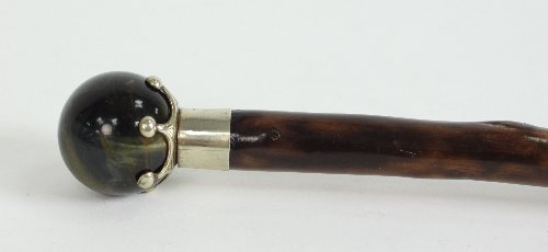 Appraisal: A walking cane the hardstone knop possibly tiger's eye with