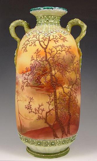 Appraisal: LARGE HAND PAINTED NIPPON VASE Two handles moriage decoration on