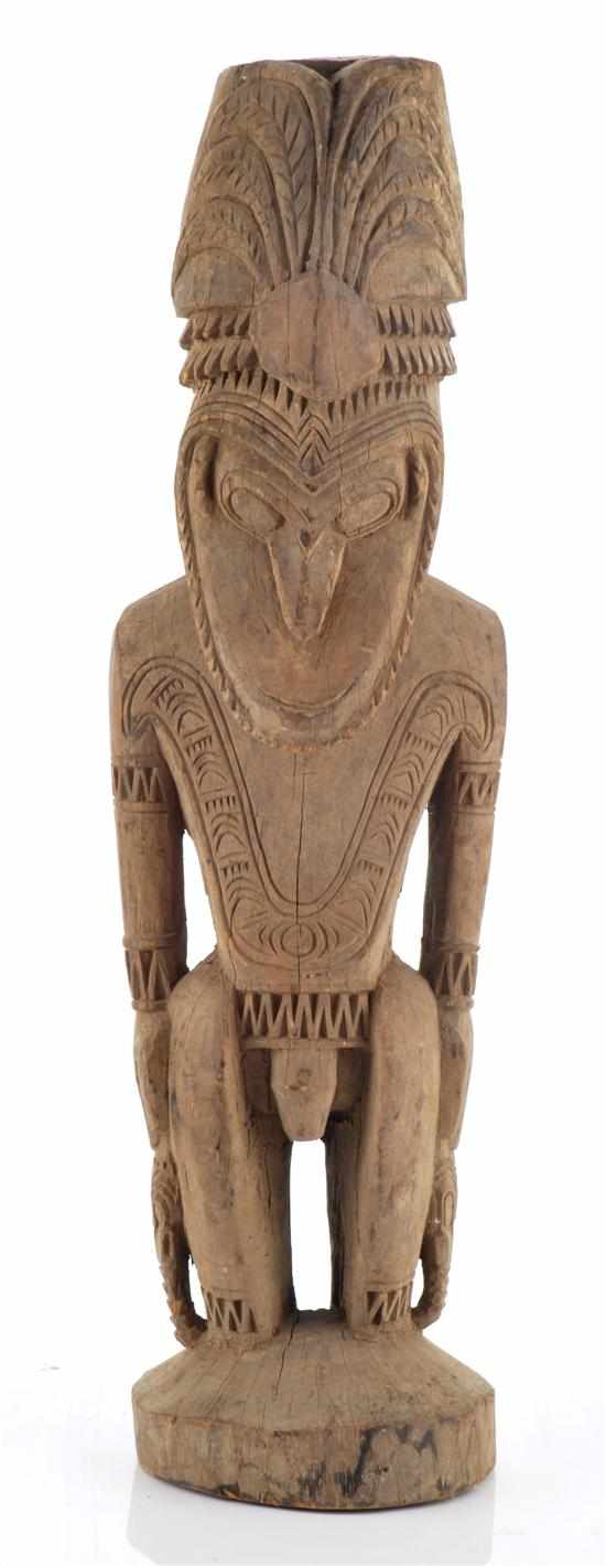 Appraisal: MURIK LAKES HOUSE POST ANCESTRAL MALE FIGURE FRAGMENT hardwood mid