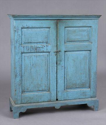 Appraisal: AMERICAN BLUE-PAINTED SIDE CABINET The molded cornice above a pair