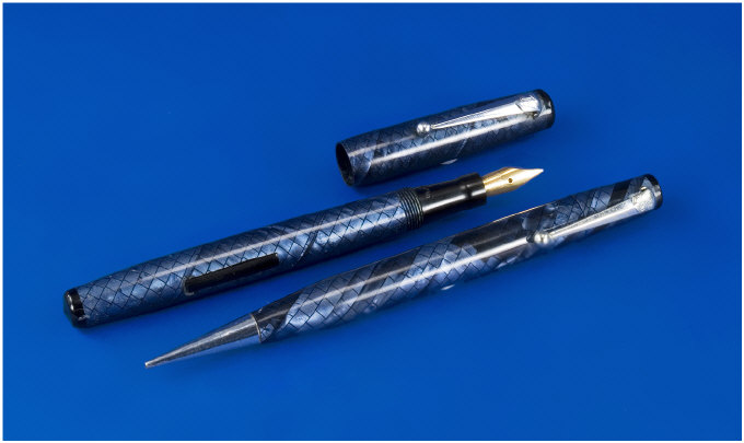 Appraisal: Swan Pen And Pencil SM blue black snakeskin with hard