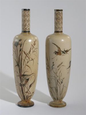 Appraisal: A pair of Martin Brothers stoneware vases tall slender form