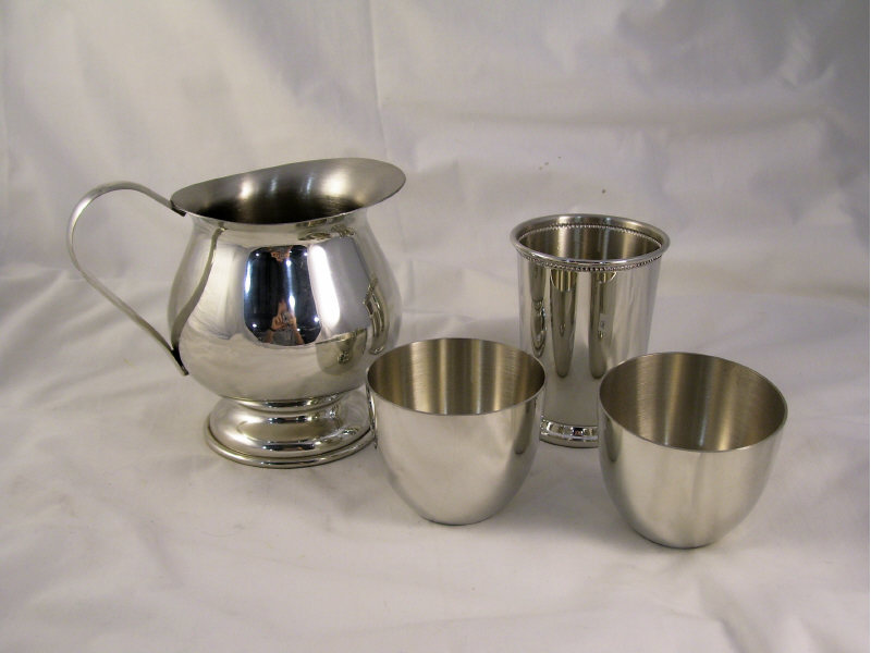 Appraisal: Empire Pewter Lot Lot includes Pitcher measures high Two open