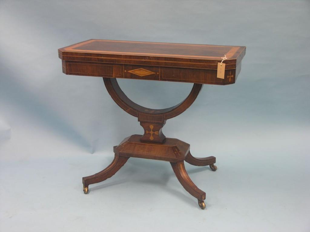 Appraisal: A George IV inlaid rosewood card table rectangular top with