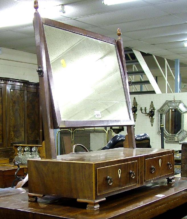 Appraisal: Early th century mahogany dressing mirror the rectangular swing plate