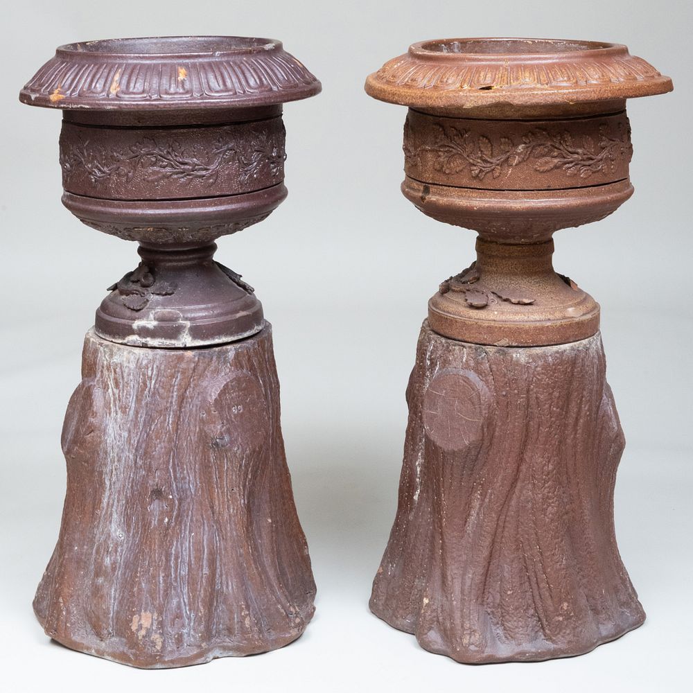 Appraisal: Pair of English Portland Stoneware Urn-Form Planters on Faux Tree