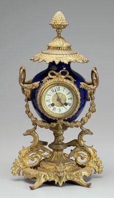 Appraisal: Ormolu-mounted porcelain clock pineapple or artichoke finial above cobalt-glazed porcelain