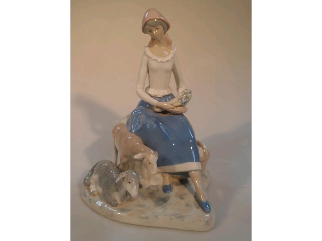 Appraisal: A Lladro figure of a young girl seated with two