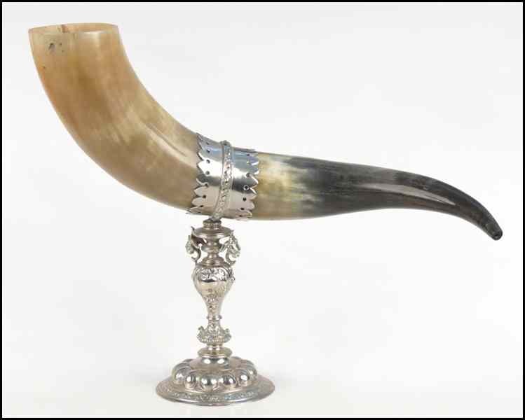 Appraisal: BULL HORN CUP Mounted on silverplate lion head embellished stand