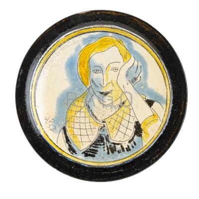 Appraisal: HENRY VARNUM POOR - Glazed faience plate with portrait of