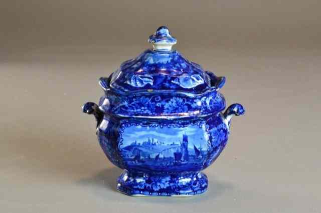 Appraisal: A Flow Blue Transferware Sugar BowlA two handled footed sugar