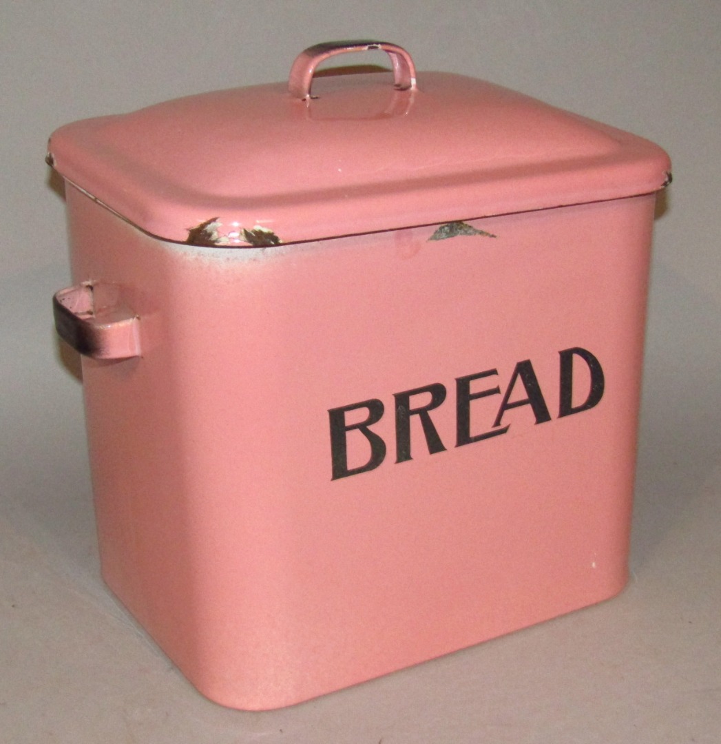 Appraisal: An early thC pink enamel bread bin with domed lid