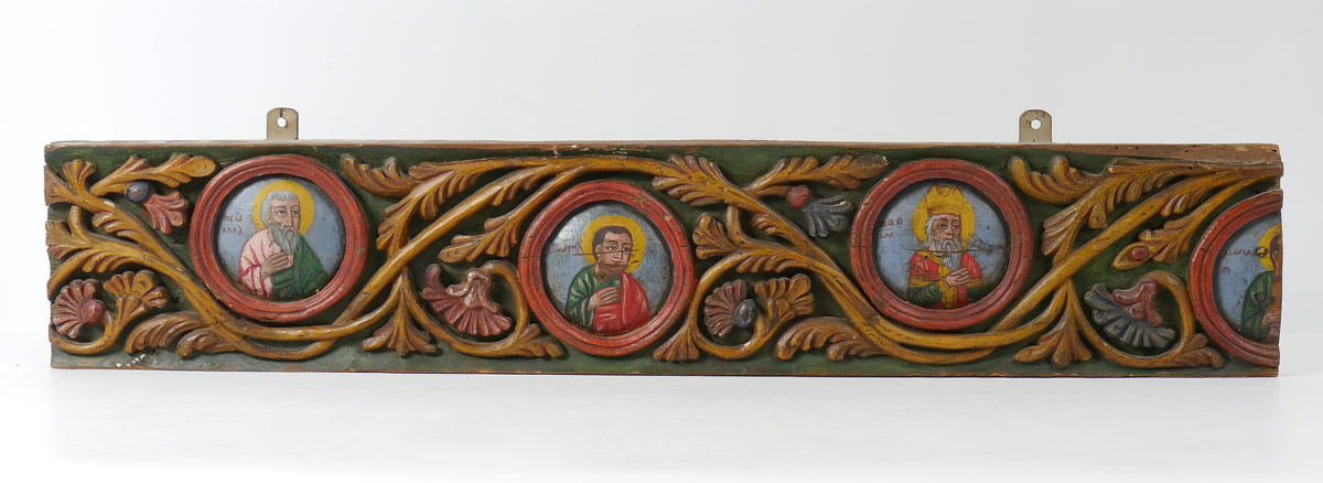 Appraisal: CARVED AND PAINTED WOOD FRIEZE FEATURING SAINTS Carved wall hanging