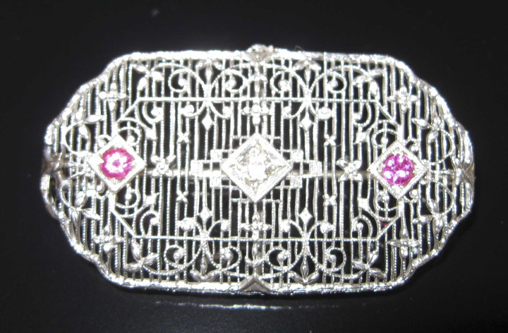 Appraisal: American Fourteen-Karat White Gold Diamond and Ruby Art Deco Brooch