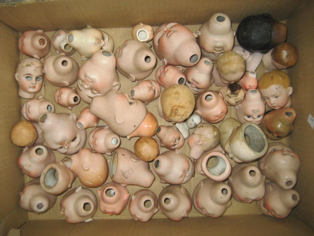 Appraisal: Approximately fifty four small bisque dolls heads including Kestner Heubach