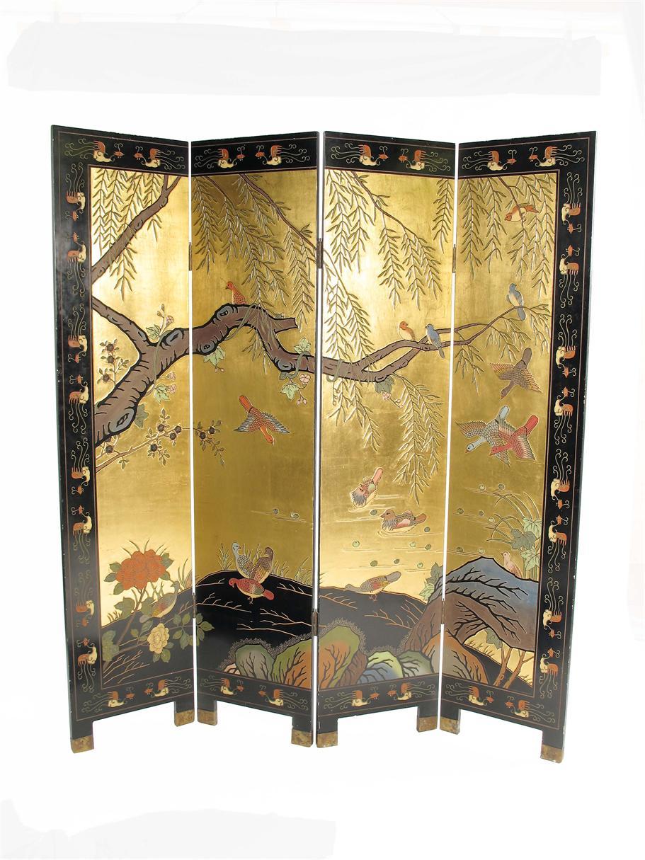 Appraisal: An oriental four fold lacquer screen