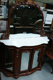 Appraisal: A Victorian mahogany mirror sideboard with white marble top