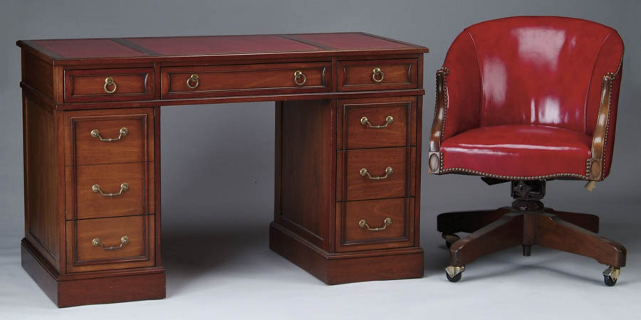 Appraisal: MAHOGANY AND RED LEATHER FLAT TOP DESK WITH MATCHING SWIVEL