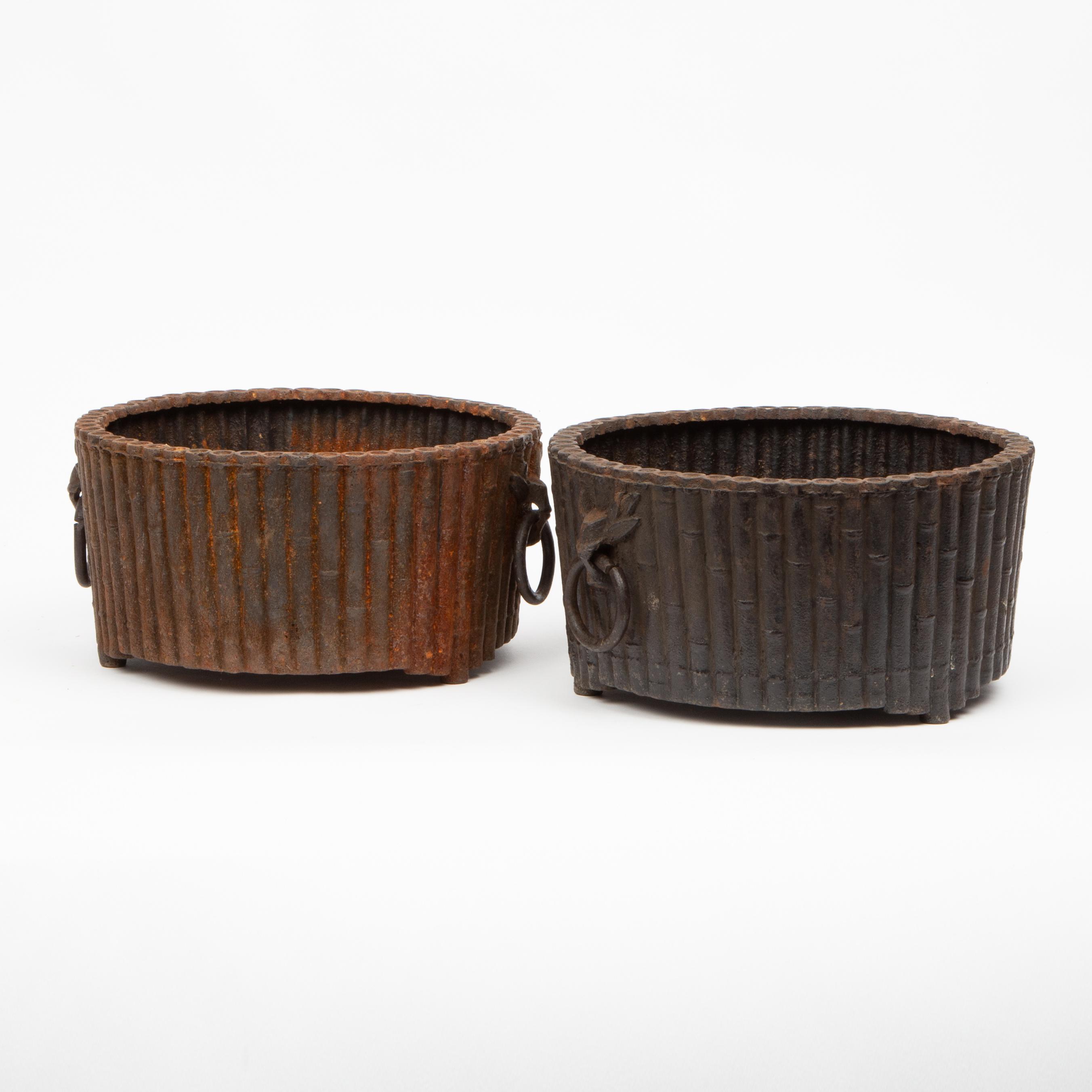 Appraisal: PAIR OF CAST IRON FAUX-BAMBOO JARDINIERES A matching pair of