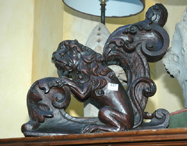 Appraisal: AN TH CENTURY WALNUT ARCHITECTURAL ADORNMENT Carved as a griffon