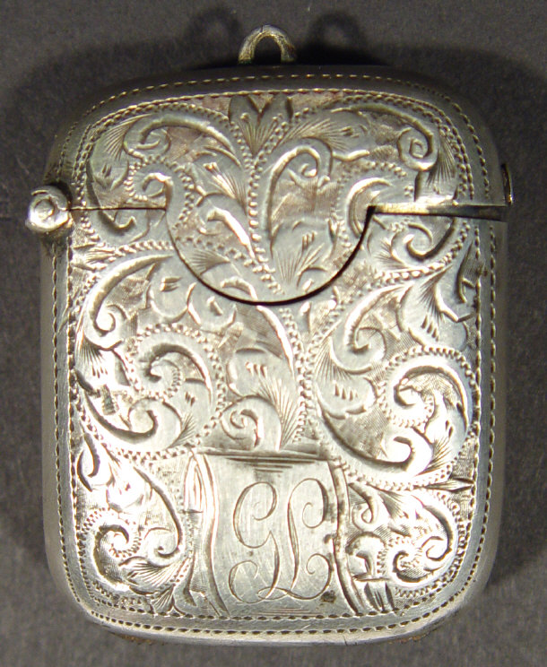 Appraisal: Edwardian twin divisional silver vesta case chased with leaves Chester