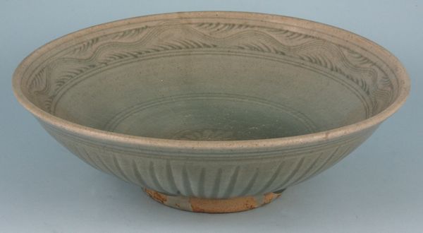 Appraisal: Celedon glazed bowl having ribbed sides diam some crazing Provenance