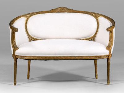 Appraisal: Louis XVI style settee carved gilt and gold-painted frame white-upholstered