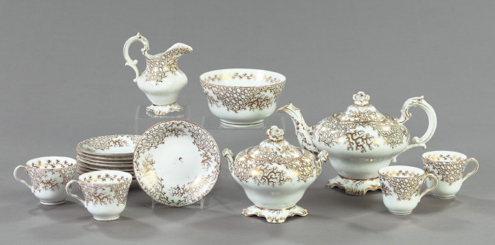 Appraisal: Attractive English Elaborately Gilded White Porcelain Tea Service for Nine