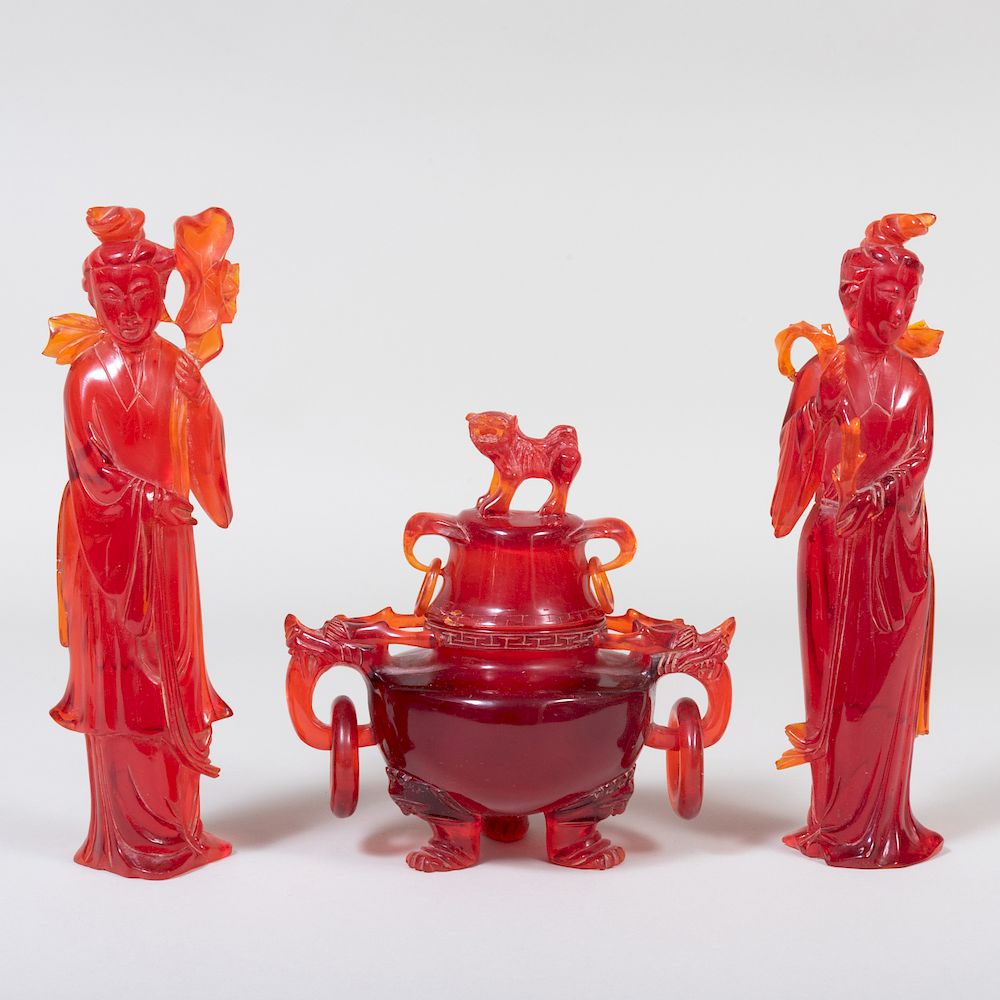 Appraisal: Three Chinese Composite 'Cherry Amber' Objects Comprising A pair of