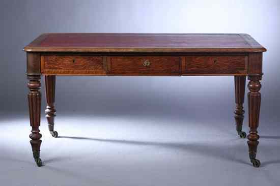 Appraisal: WILLIAM IV OAK PARTNER'S LIBRARY DESK circa Rectangular inset leather