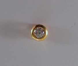 Appraisal: An ct gold collet set round brilliant cut diamond pendant