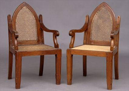 Appraisal: PAIR OF ENGLISH COLONIAL GOTHIC REVIVAL MAHOGANY CANED ARMCHAIRS Each