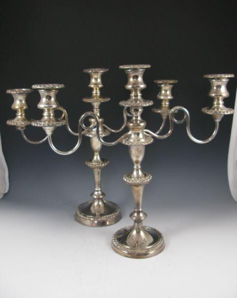 Appraisal: Pair of Silverplate Candelabra unmarked three light with scroll arms