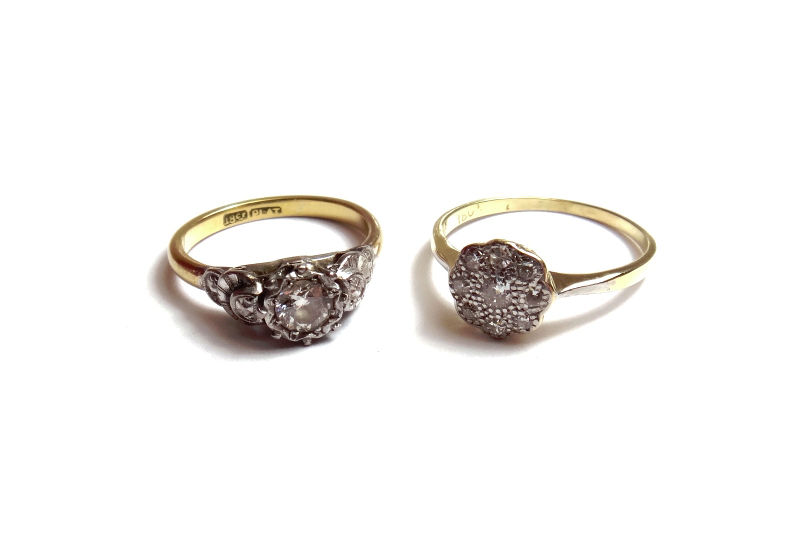 Appraisal: A gold and platinum diamond set single stone ring mounted