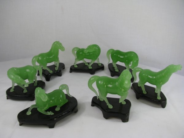 Appraisal: Seven miniature hand blown jade green colored glass horses in