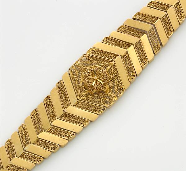 Appraisal: A ten karat gold open work bracelet weighing approximately grams