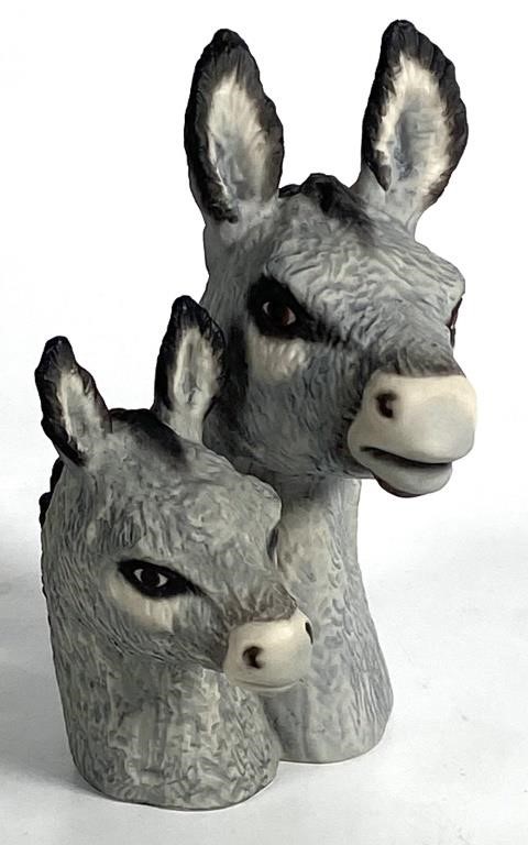 Appraisal: Porcelain duo donkey heads sculpted by Laszlo Ispanky Measures about