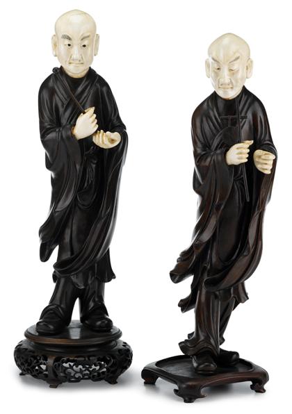 Appraisal: Tall pair of Chinese carved hardwood and ivory mounted immortal