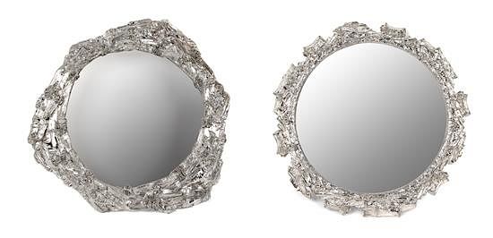 Appraisal: A Pair of Silvered Metal Mirror-Top Table Plateaus Width of