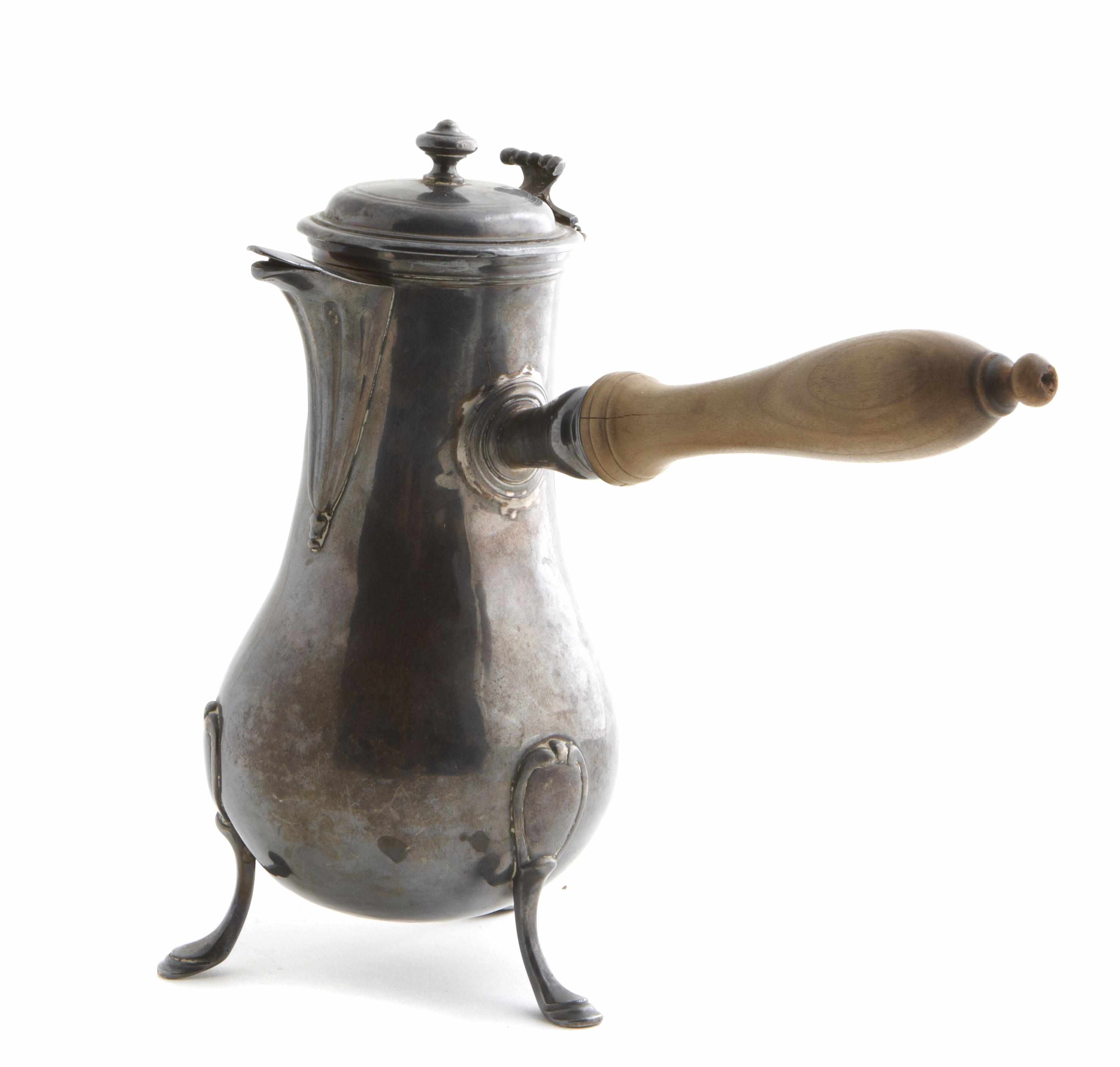 Appraisal: French silver tripod coffee pot with wooden handle Height in