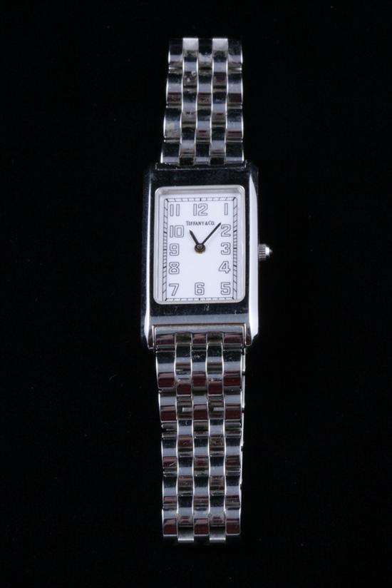 Appraisal: LADY'S TIFFANY CO STAINLESS STEEL WRISTWATCH Rectangular case centers white