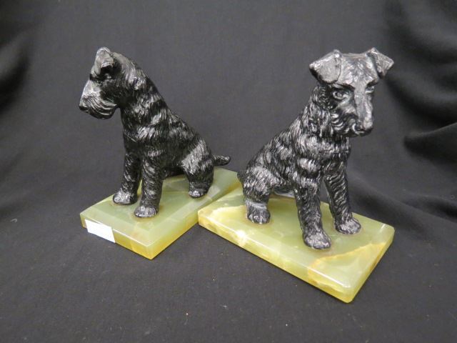 Appraisal: Pair of Cast Iron Figural Bookends of Terriers onyx bases