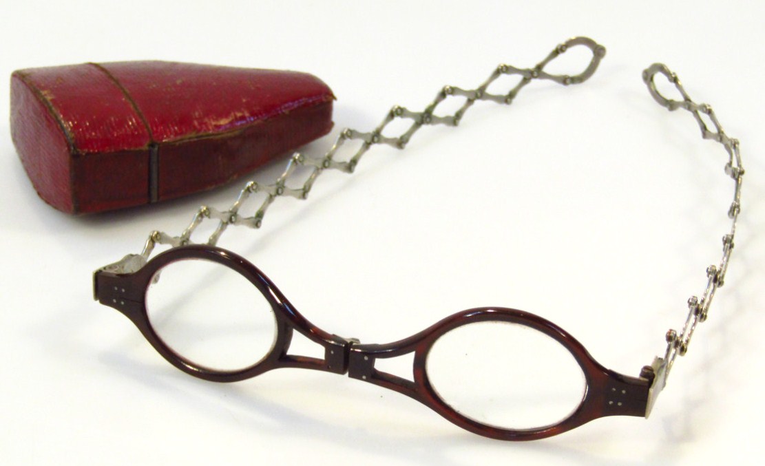 Appraisal: A pair of thC tortoiseshell and white metal folding spectacles