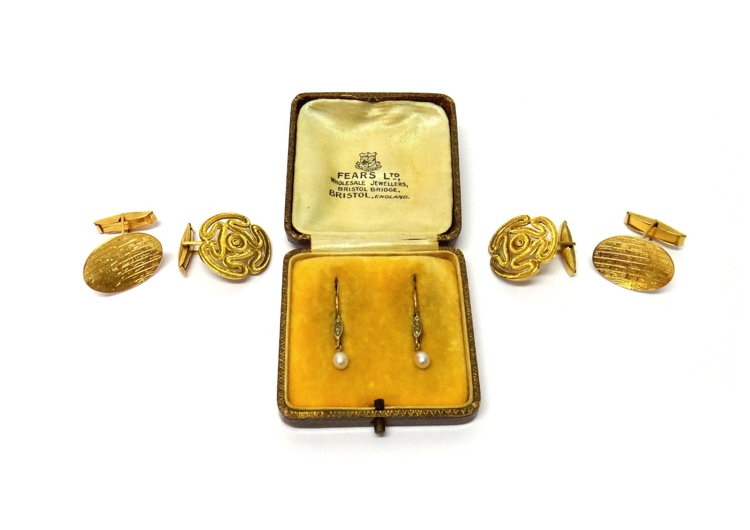 Appraisal: A pair of cufflinks the fronts of dished oval form