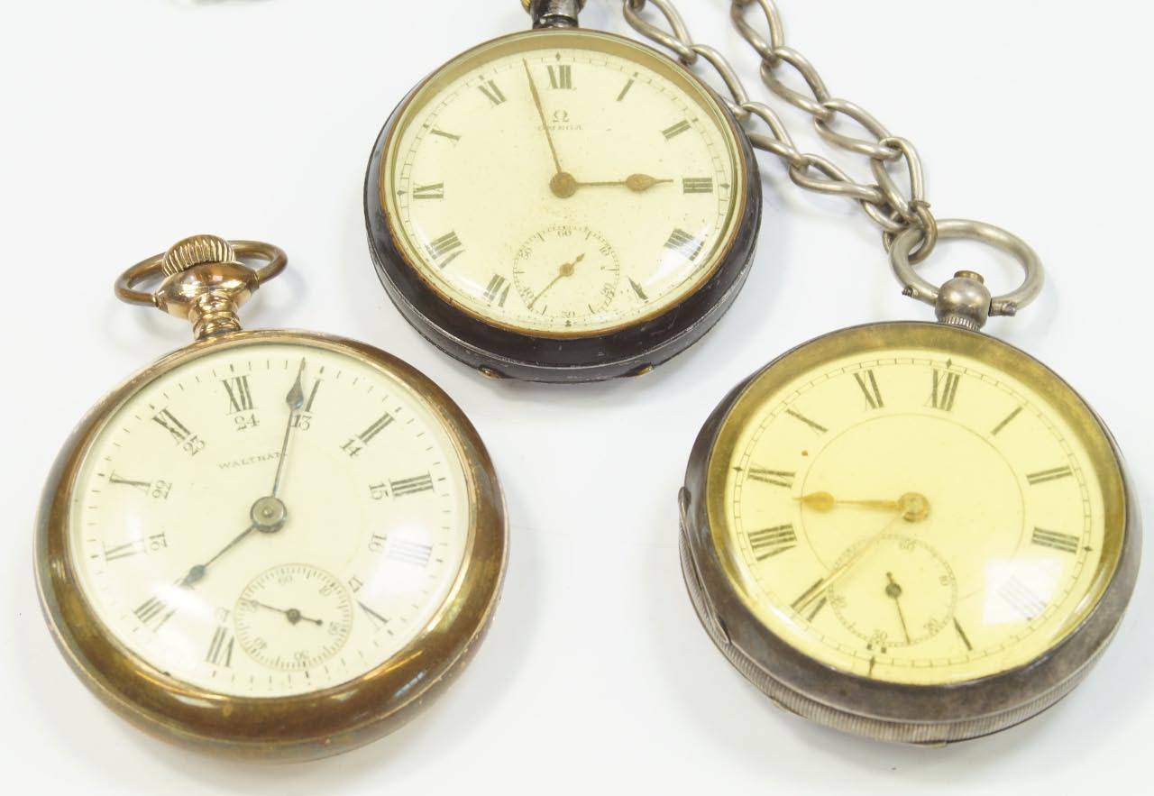 Appraisal: A Waltham gold plated pocket watch two white metal examples