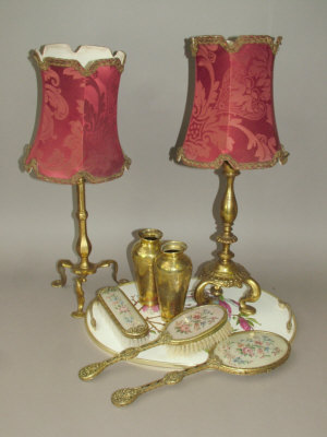 Appraisal: Two gilt brass table lamps with crimson silk shades a