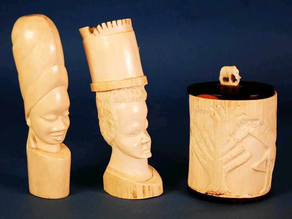 Appraisal: TWO SIMILAR AFRICAN CARVED IVORY BUSTS OF NATIVE MAN AND