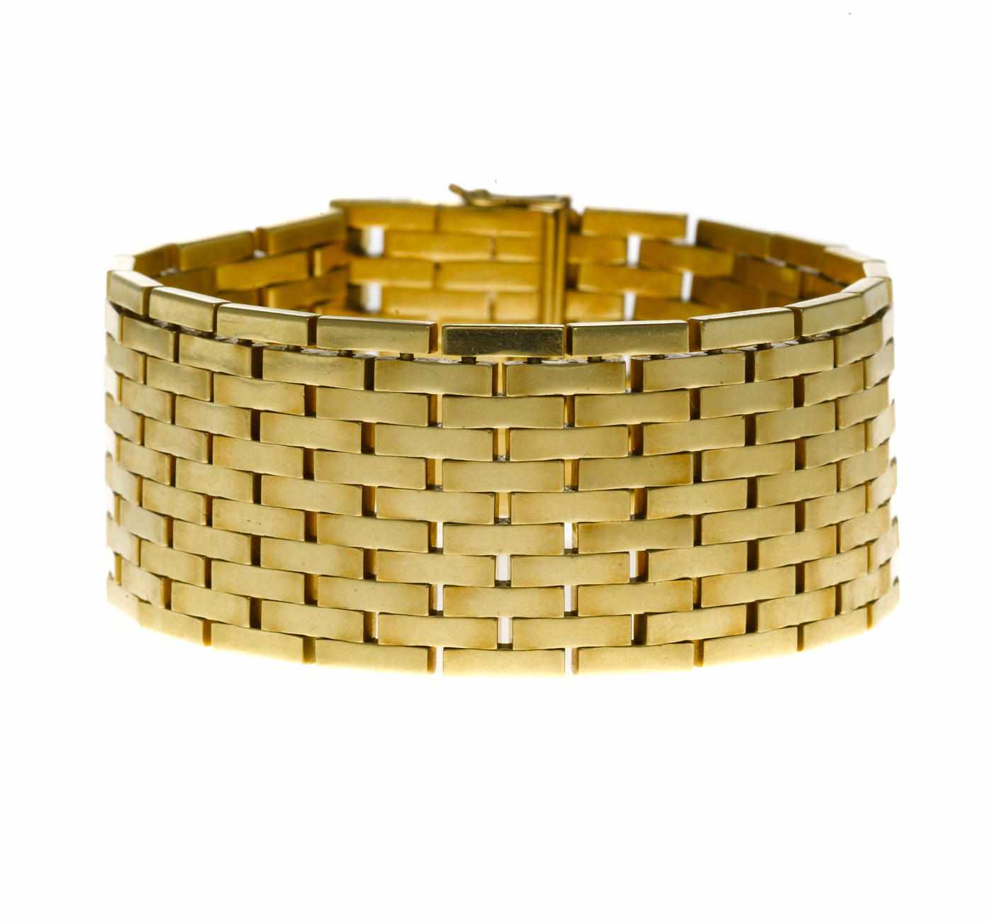 Appraisal: An eighteen karat gold brick link bracelet weighing approximately grams