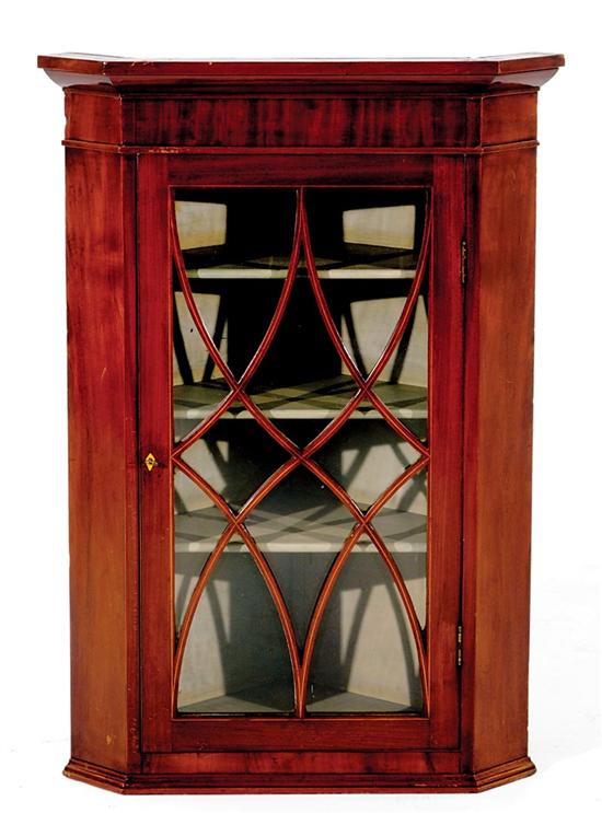 Appraisal: Georgian inlaid mahogany hanging corner cabinet circa molded cornice over